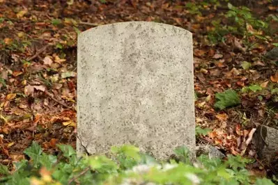 old gravestone during fall