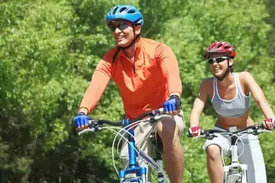 a couple riding their bikes